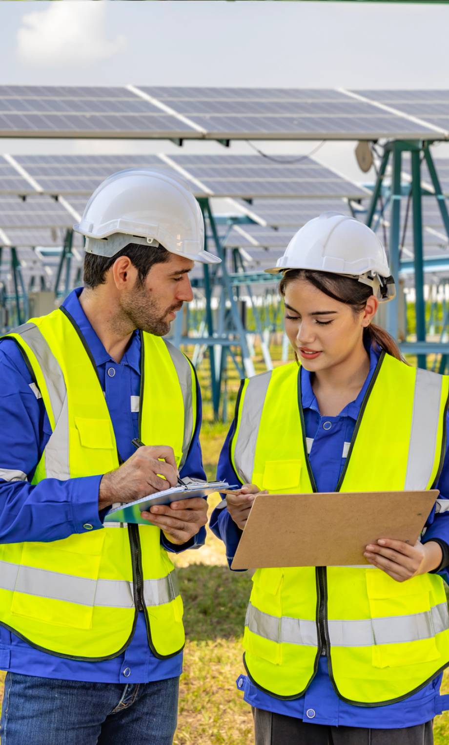 Wind turbine service engineer maintenance and plan for inspection at construction site, renewable electricity generator.